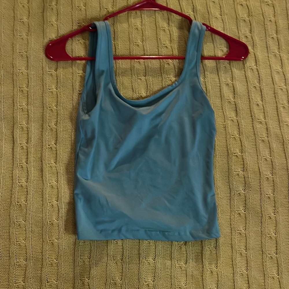 Teal tank top size S.